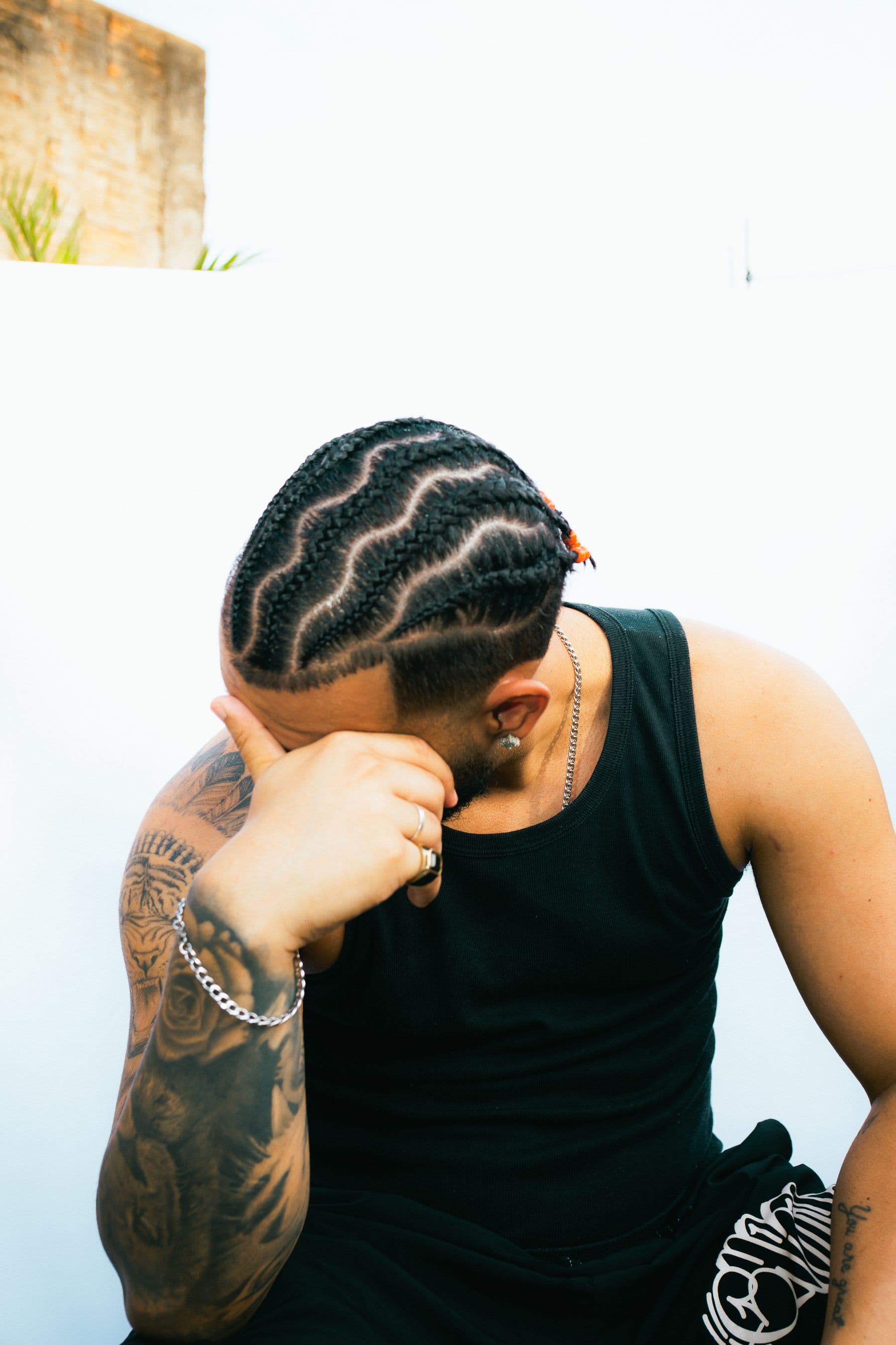 Detailed curved cornrows with clean parting